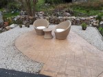 Shaped patio area in pattern imprinted concrete,  with gravel surrounds, by GM Hard Landscapes, County Donegal, Ireland