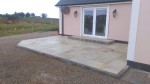 Natural stone patio with decorative gravel surround  laid by  GM Hard Landscapes, Donegal, Ireland